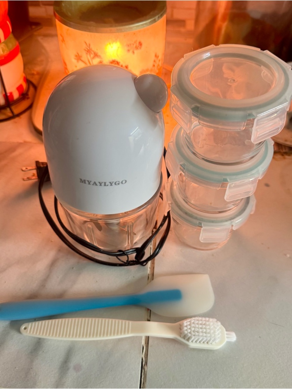 Myaylygo baby food maker with 3 glass jars, spatula, and cleaning brush